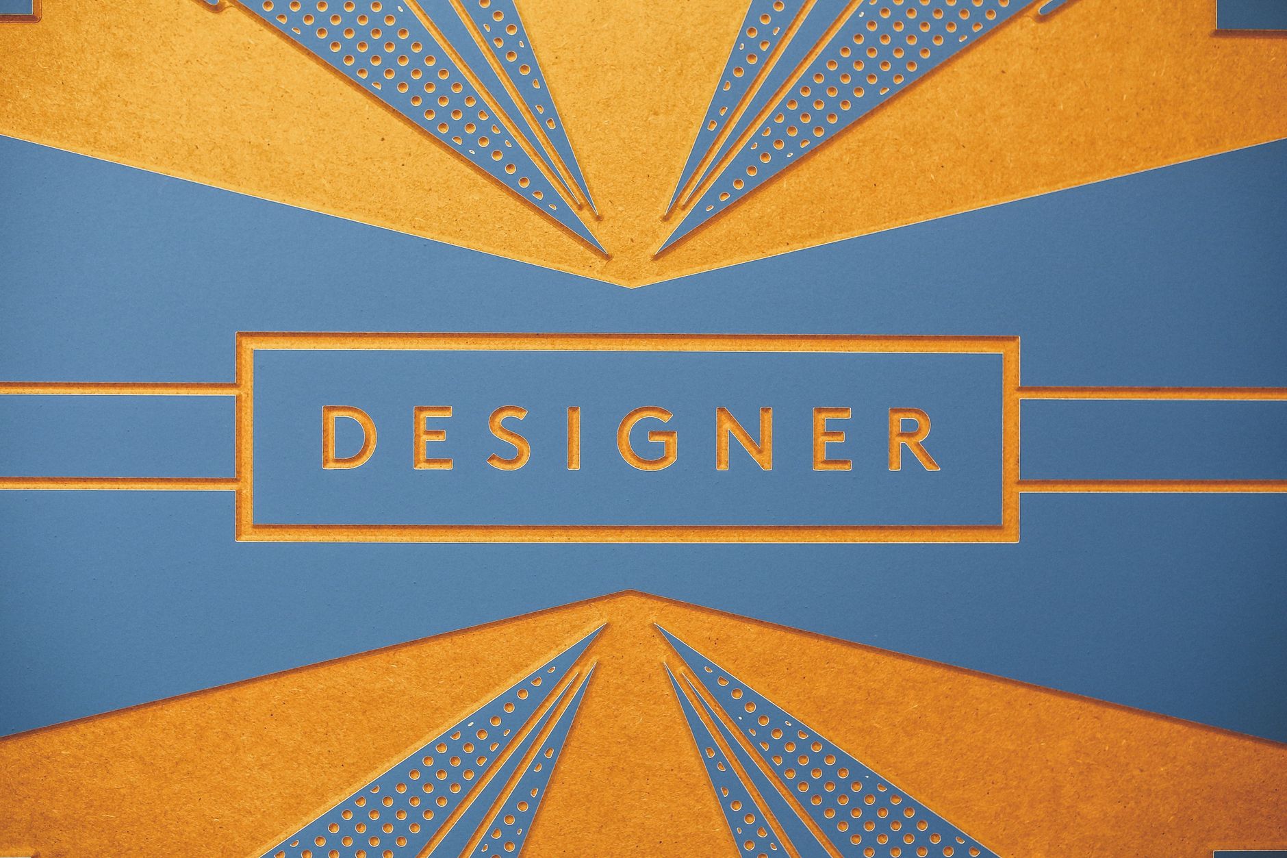 Geometric art print with a blue and orange 'DESIGNER' theme for artistic inspiration. — "Convenient Panelling Kits for Quick