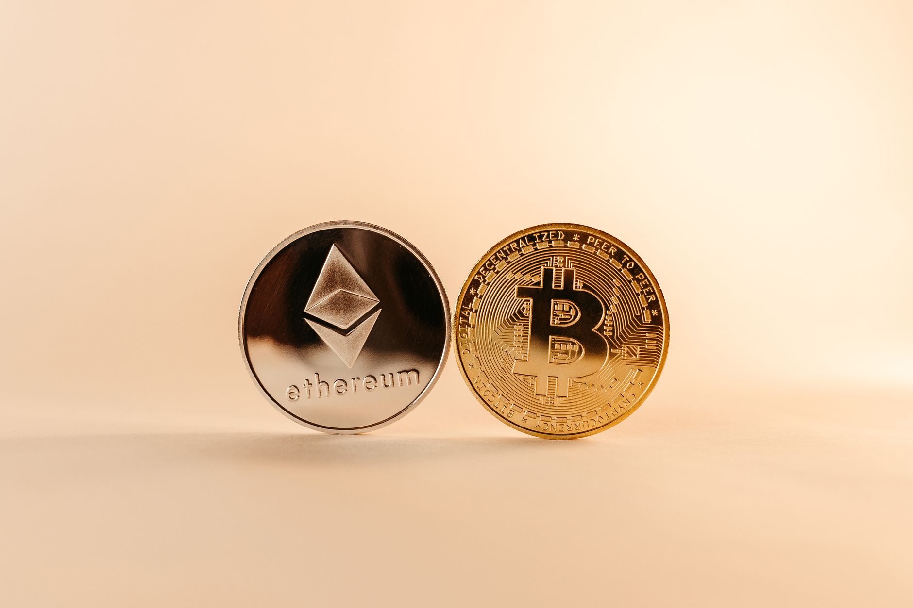 Close-up of Bitcoin and Ethereum coins symbolizing digital currency and blockchain technology. — What role do smart contracts